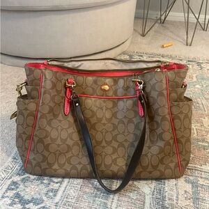 Coach Brown and Red bag
Bag straps aren't Coach, cherry charm NOT included